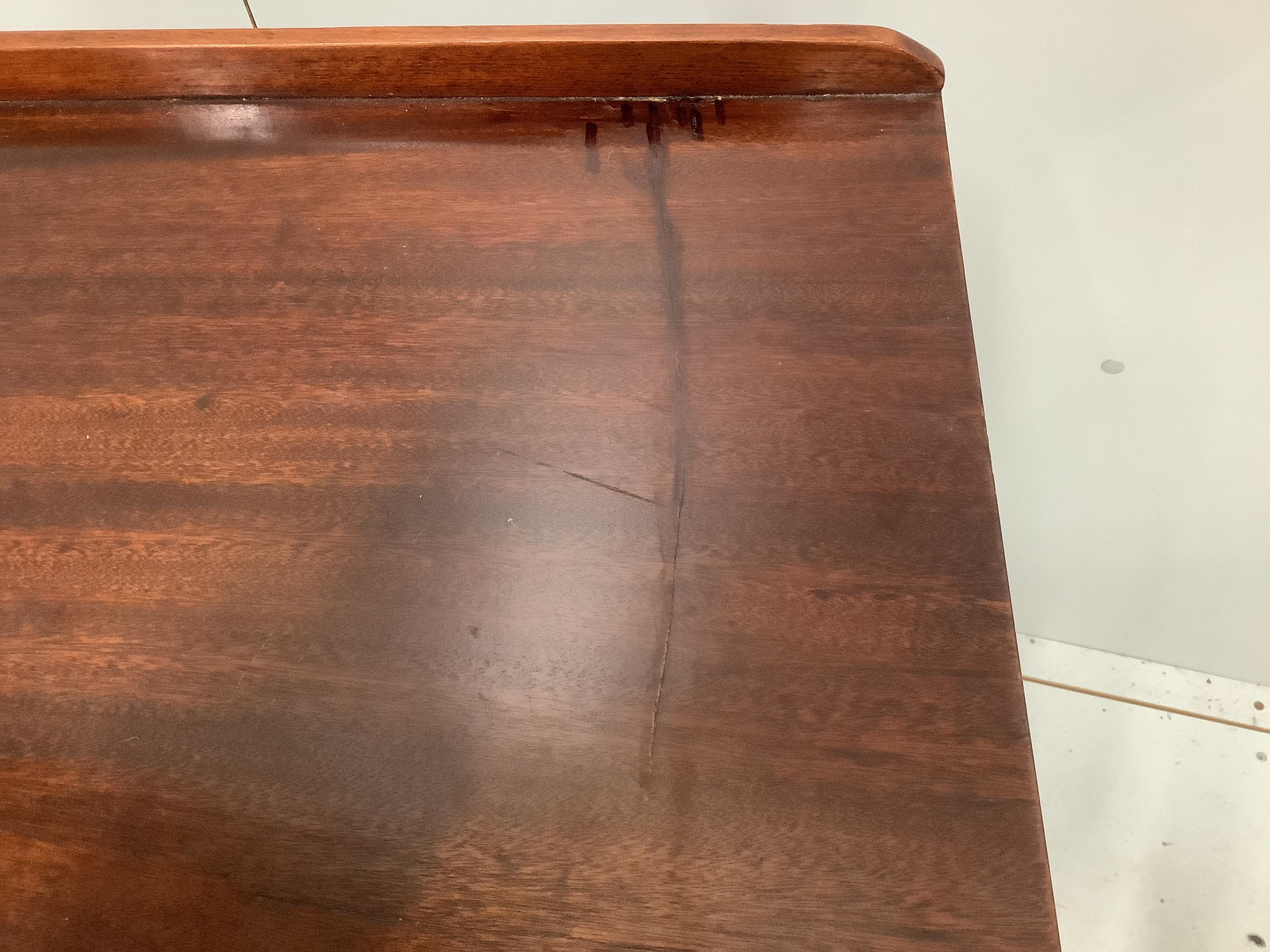 A small Edwardian mahogany bowfront side cabinet, width 76cm, depth 49cm, height 80cm